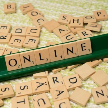 The word online is spelled out with scrabble tiles